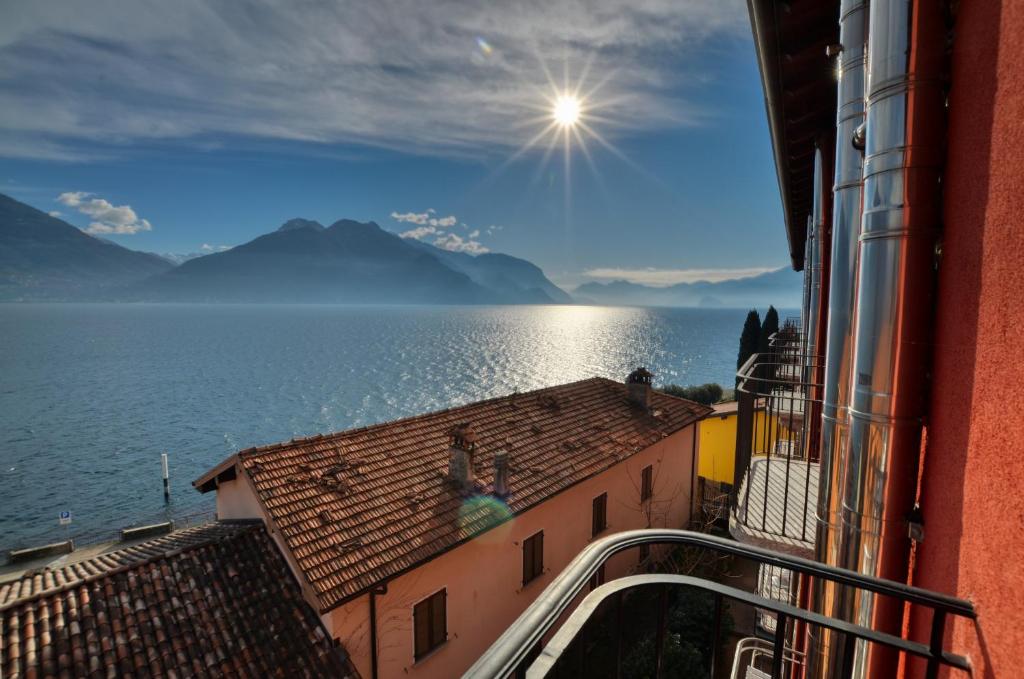 a view of the ocean from a balcony of a building at Lake View Apartment Golden Triangle in Acquaseria