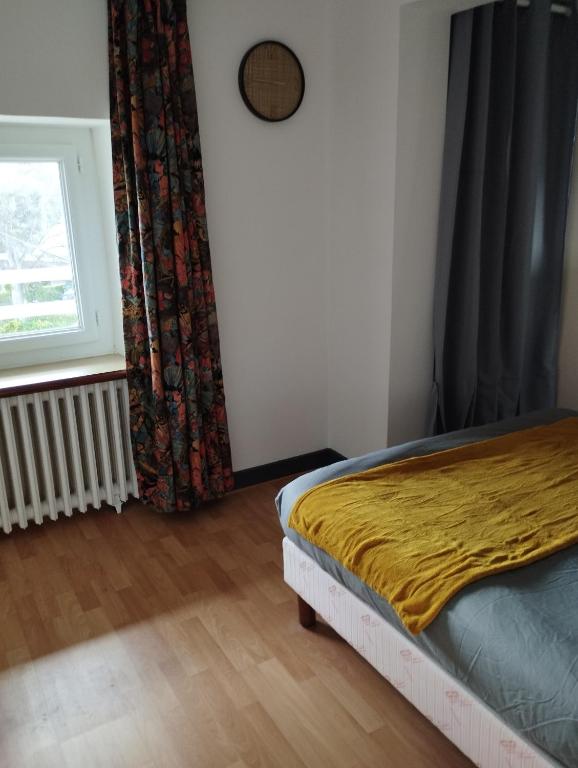 Postel nebo postele na pokoji v ubytování L'Albatros