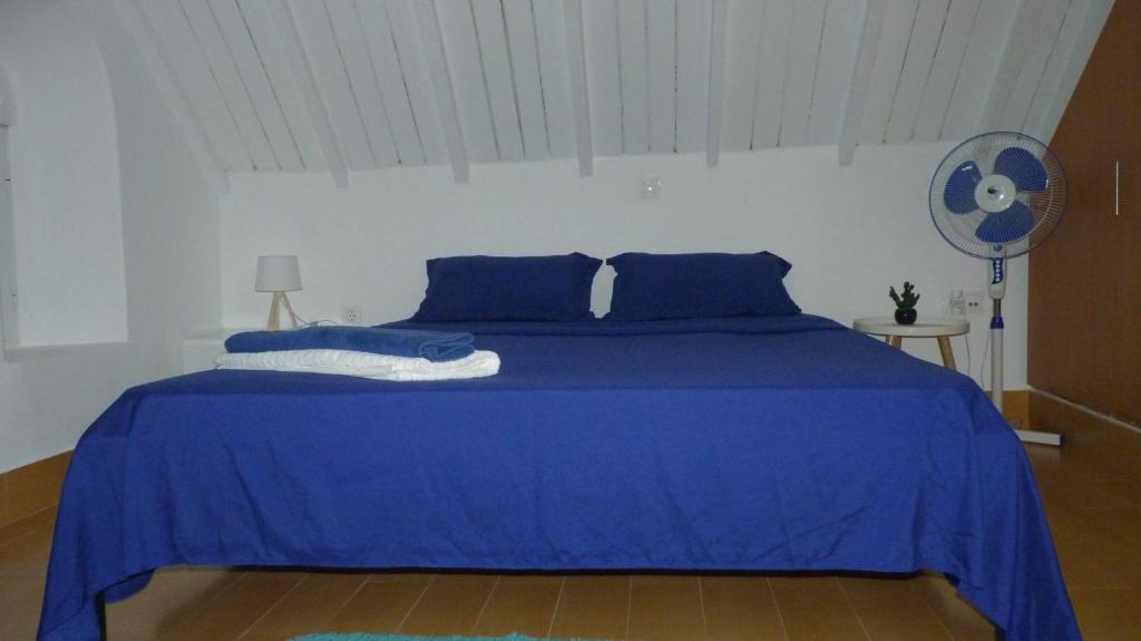 Postel nebo postele na pokoji v ubytování KAZARÃO di MAVETE