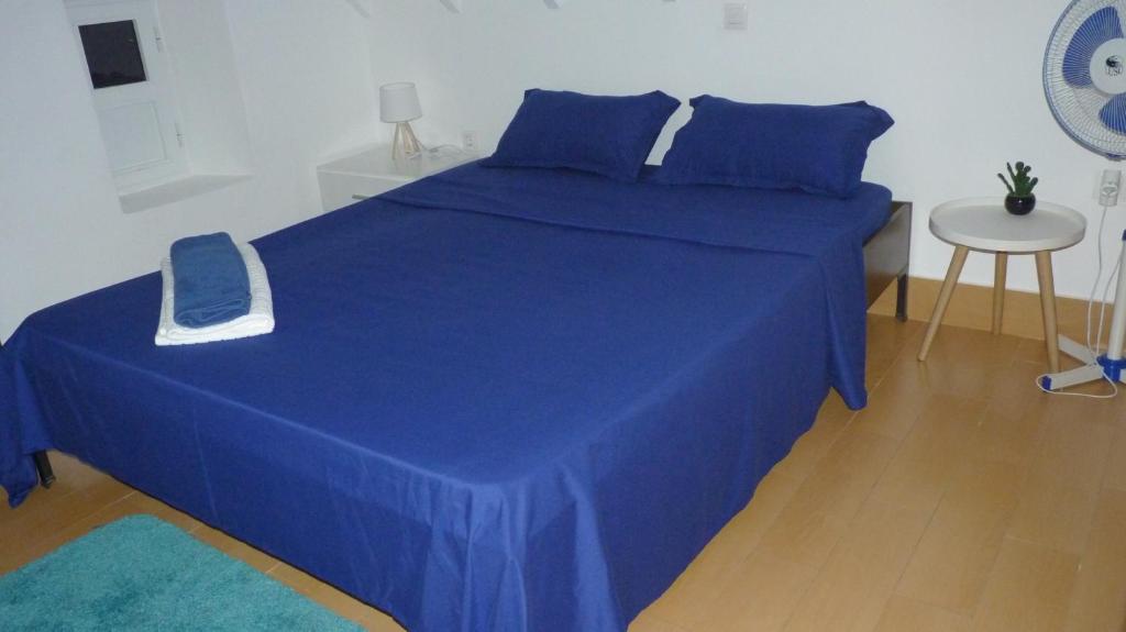 Postel nebo postele na pokoji v ubytování KAZARÃO di MAVETE