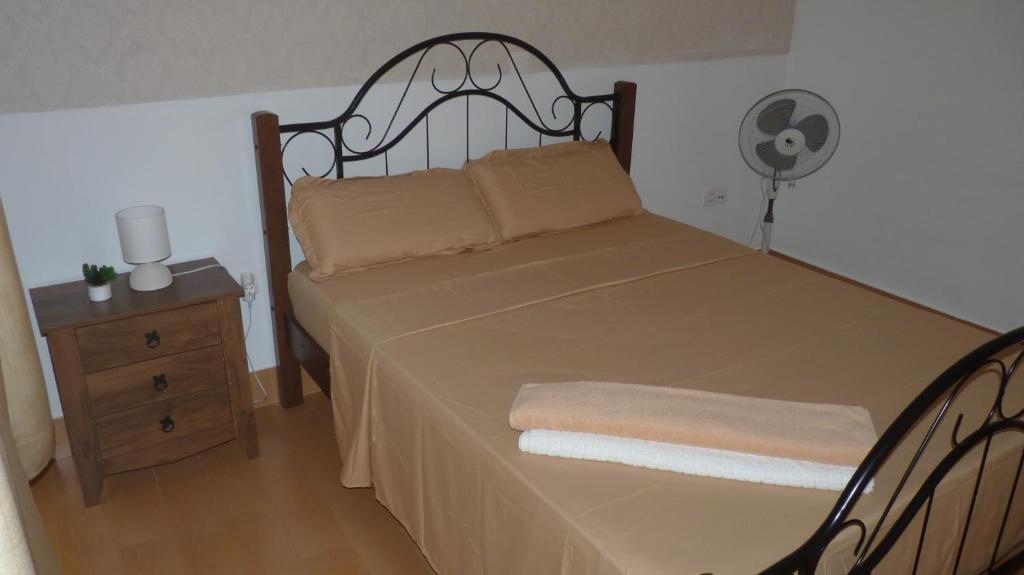 Postel nebo postele na pokoji v ubytování KAZARÃO di MAVETE