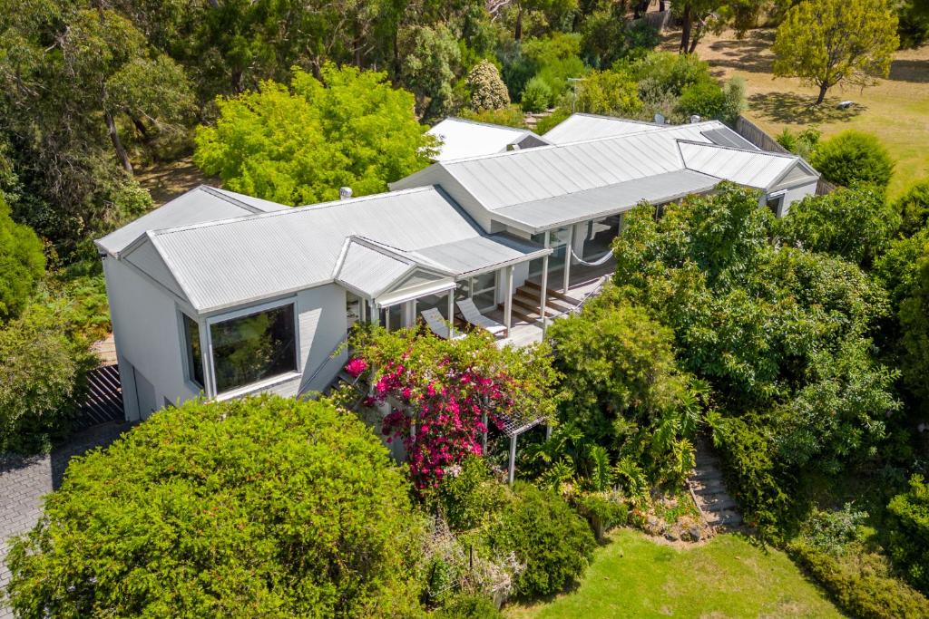 an aerial view of a house with a garden at Spacious home with ocean views in Dromana