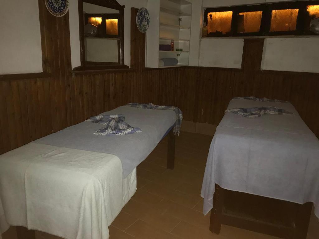 Postel nebo postele na pokoji v ubytování Kahraman Hotel