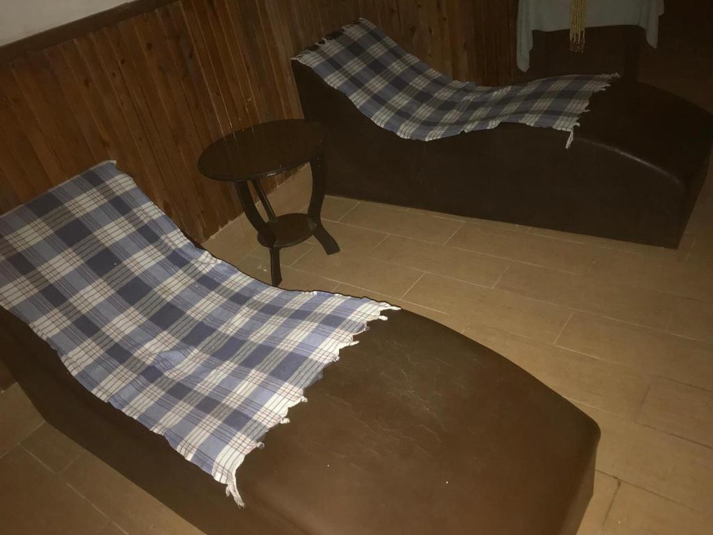 Postel nebo postele na pokoji v ubytování Kahraman Hotel