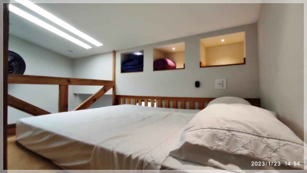 Cama o camas de una habitación en Loft Cidade Industrial