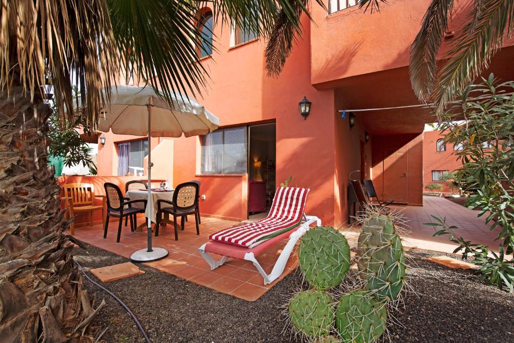 Patio nebo venkovní prostory v ubytování Oasis Tamarindo sport e relax