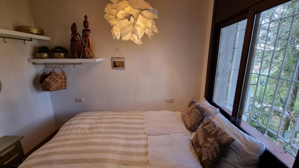 Posteľ alebo postele v izbe v ubytovaní Casa Coene
