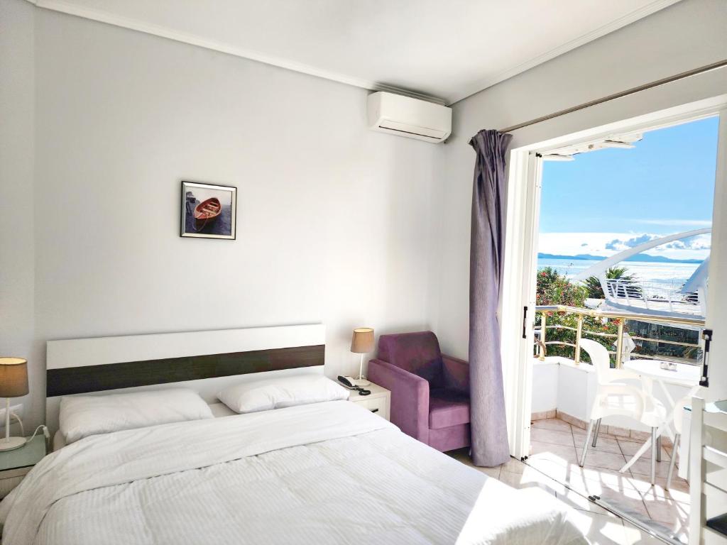 Postel nebo postele na pokoji v ubytování Hotel JoAn