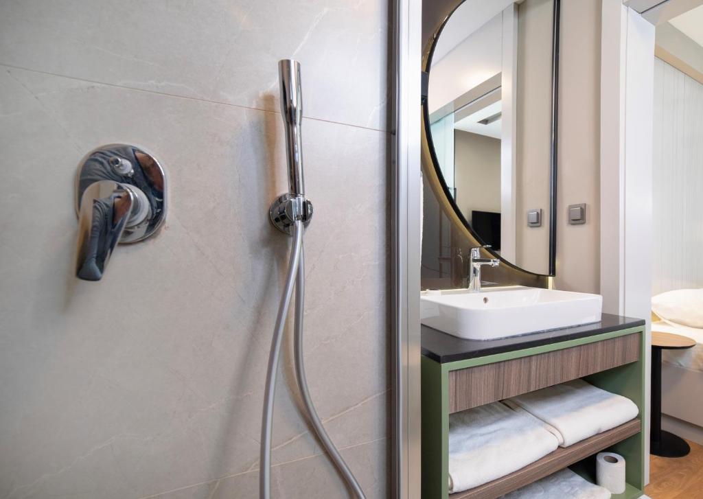 Koupelna v ubytování Vesta Rooms