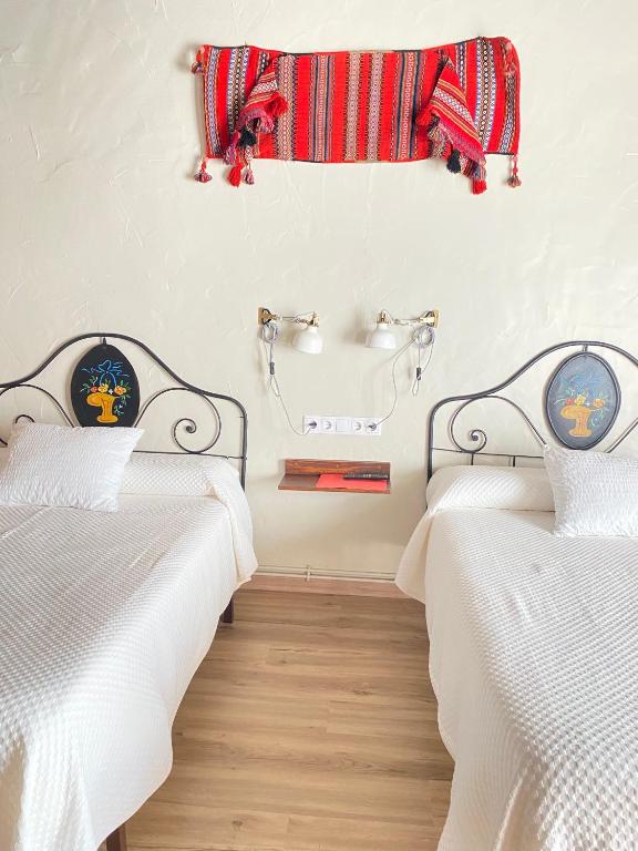 Postel nebo postele na pokoji v ubytování Casa Sara