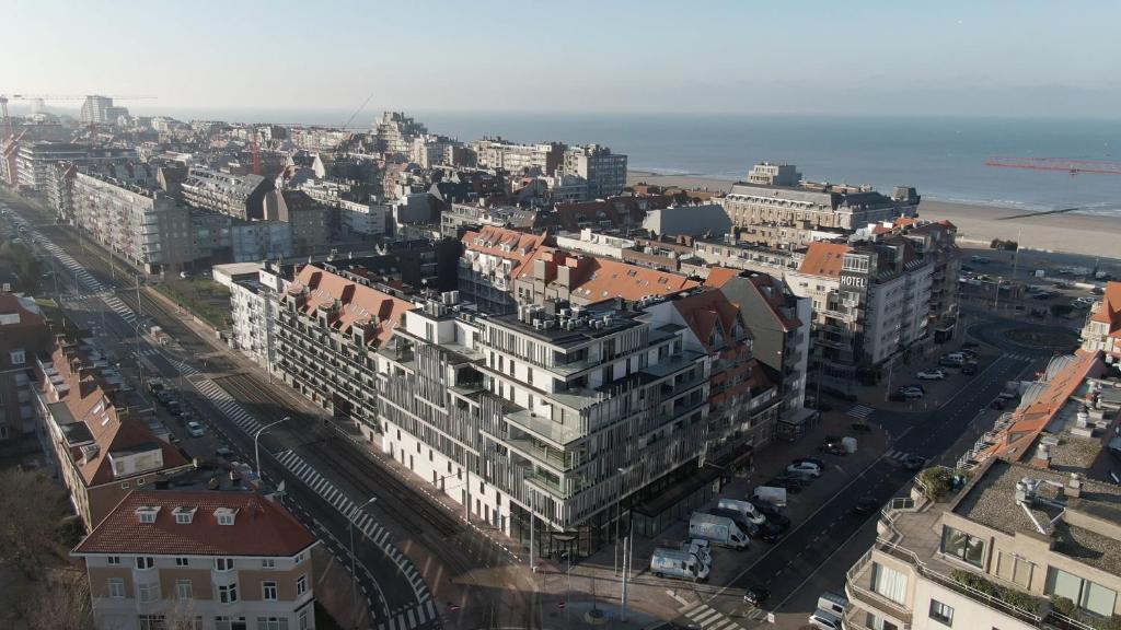 an aerial view of a city with buildings at The CORNR Hotel in Nieuwpoort