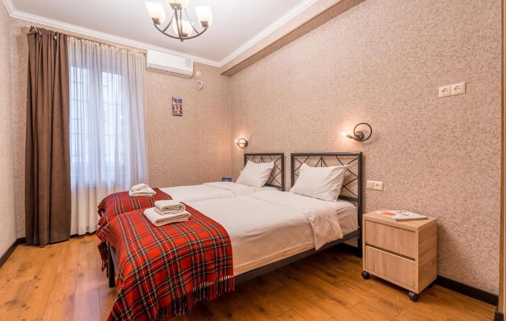 Postel nebo postele na pokoji v ubytování Hotel at Gomi 19