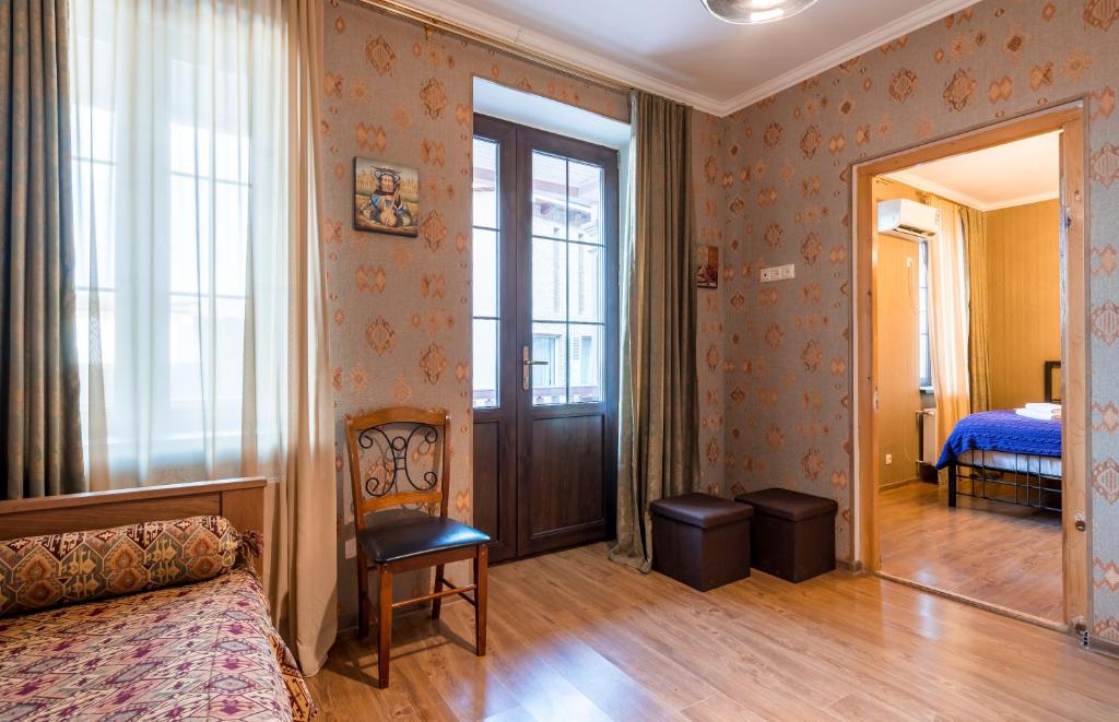 Postel nebo postele na pokoji v ubytování Hotel at Gomi 19