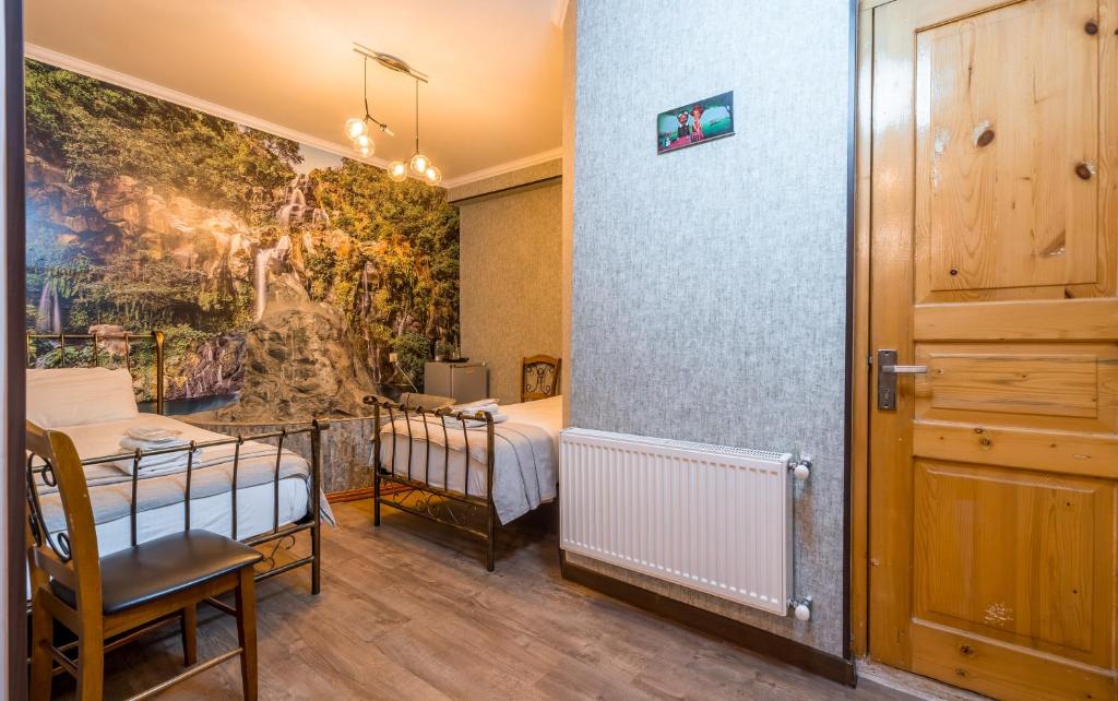 Postel nebo postele na pokoji v ubytování Hotel at Gomi 19