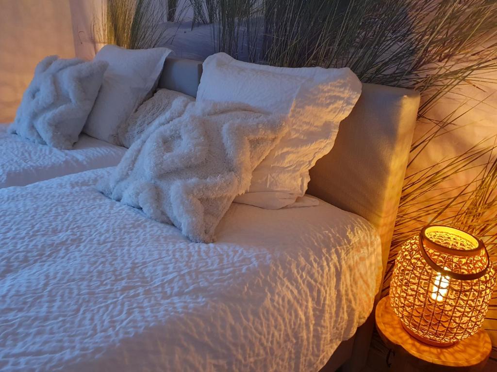 Postel nebo postele na pokoji v ubytování Vakantiewoning De Gavers