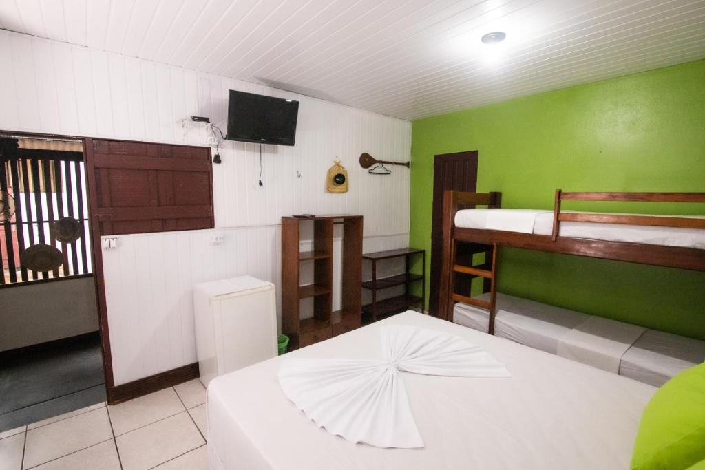 Postel nebo postele na pokoji v ubytování Pousada Coração Verde