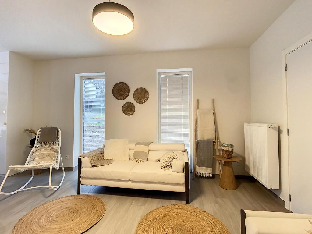 Posezení v ubytování Vakantiewoning De Gavers