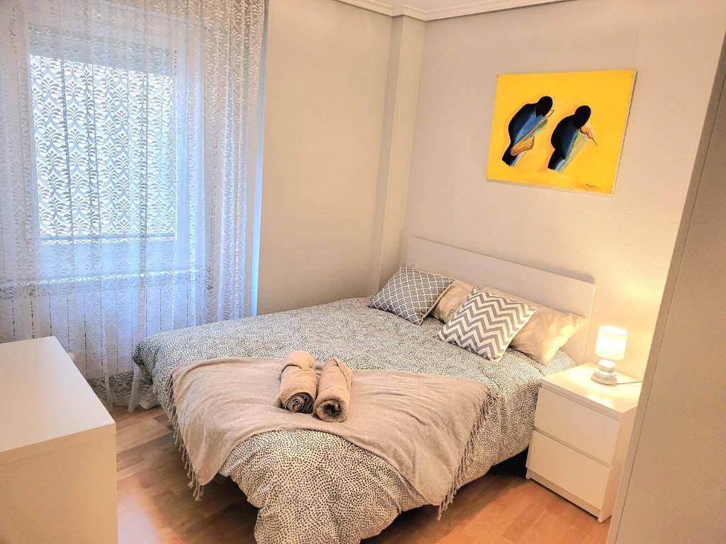 Posteľ alebo postele v izbe v ubytovaní La casita de las campanas