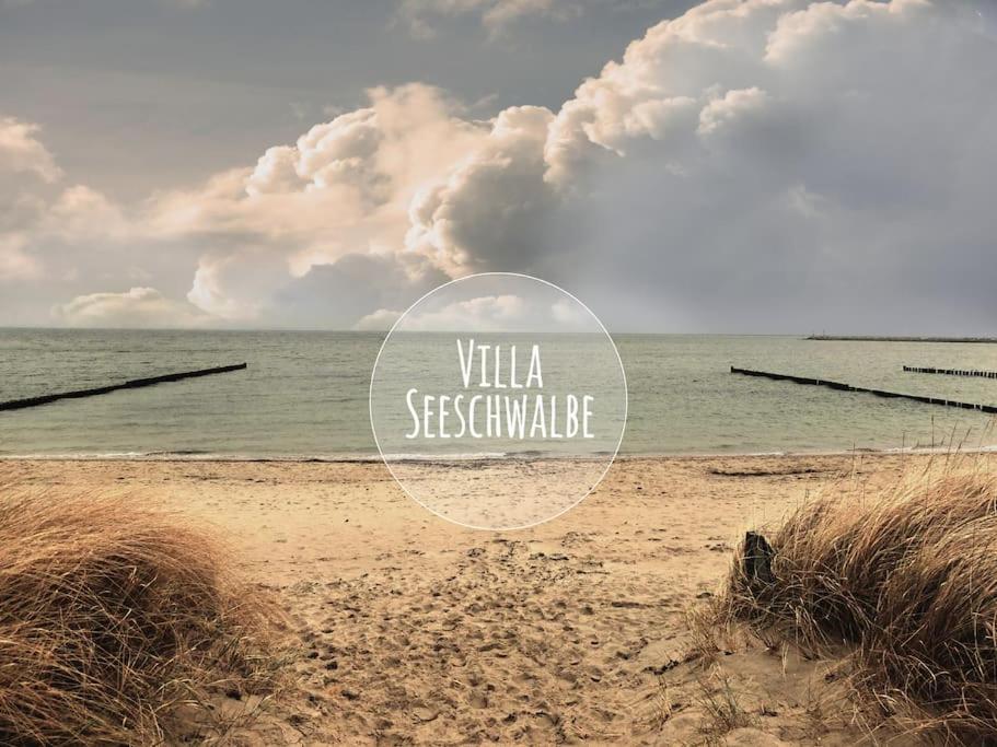 a beach with the words villa seagate sustainable at Gemütliche 2 Zi-FeWo mit Terrasse, Strandnähe, WIFI in Breege