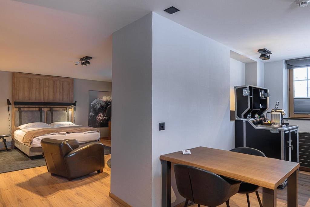 Ein Bett oder Betten in einem Zimmer der Unterkunft ALPINE INN Davos