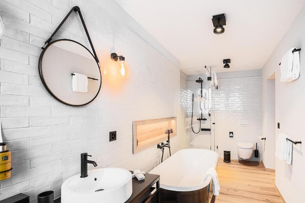 Ein Badezimmer in der Unterkunft ALPINE INN Davos