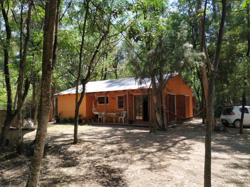 a house in the middle of a forest at Mis Soles in Santa Ana