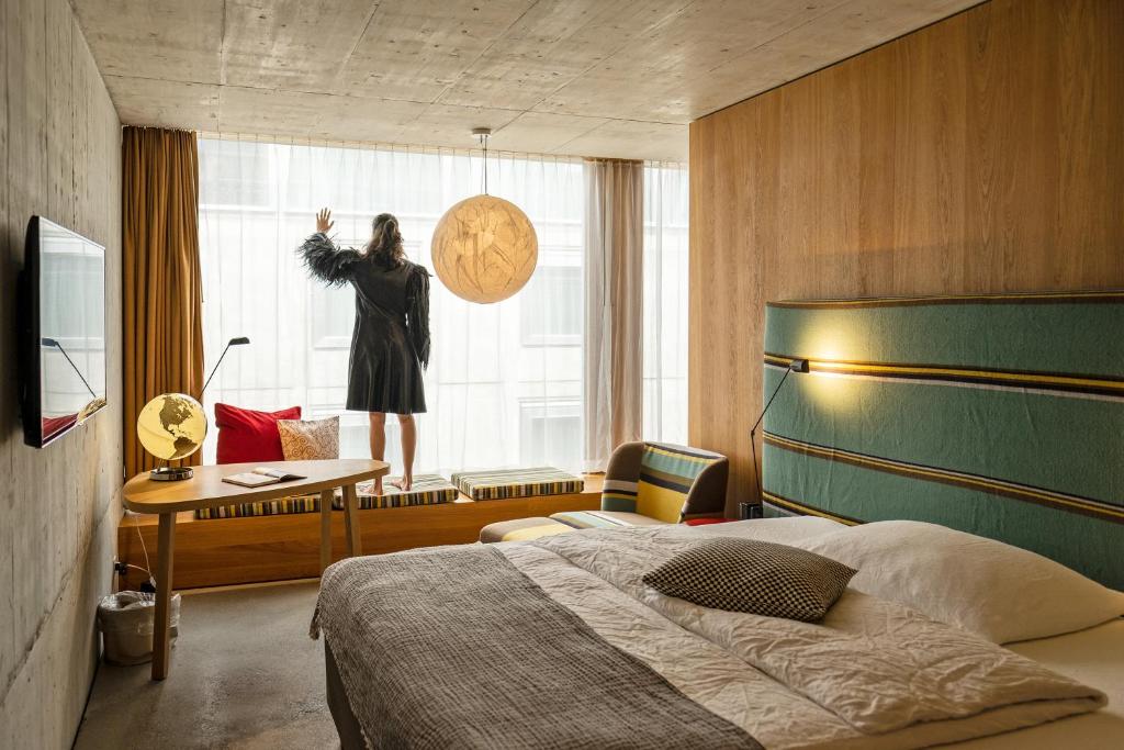 Postel nebo postele na pokoji v ubytování Nomad Design & Lifestyle Hotel