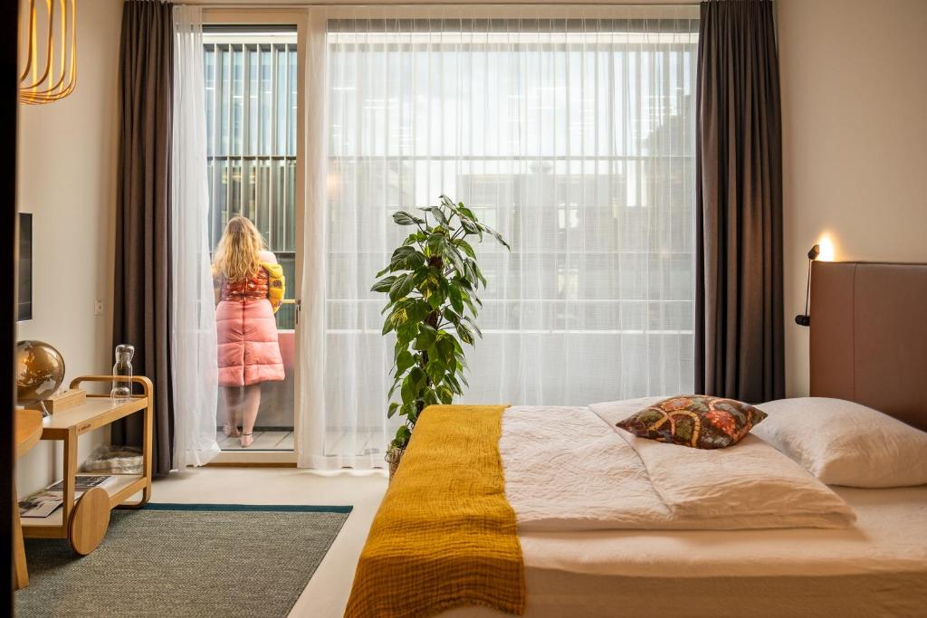 Postel nebo postele na pokoji v ubytování Nomad Design & Lifestyle Hotel