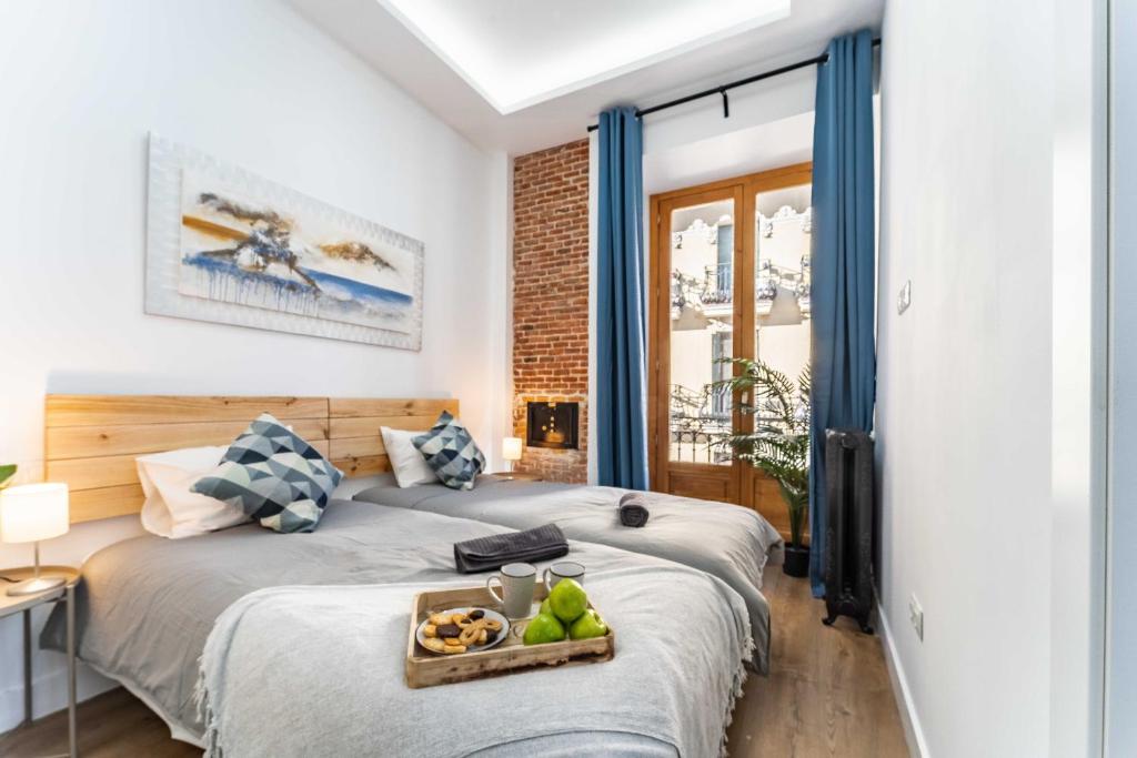 Postel nebo postele na pokoji v ubytování Exclusive Luxury Apartment in Central Madrid