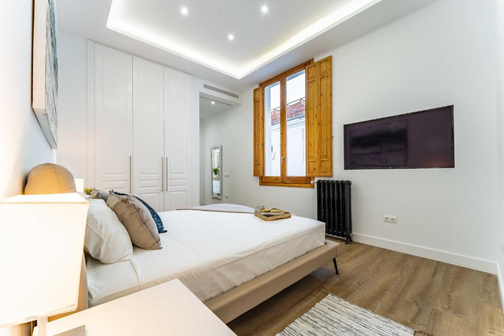 Postel nebo postele na pokoji v ubytování Exclusive Luxury Apartment in Central Madrid