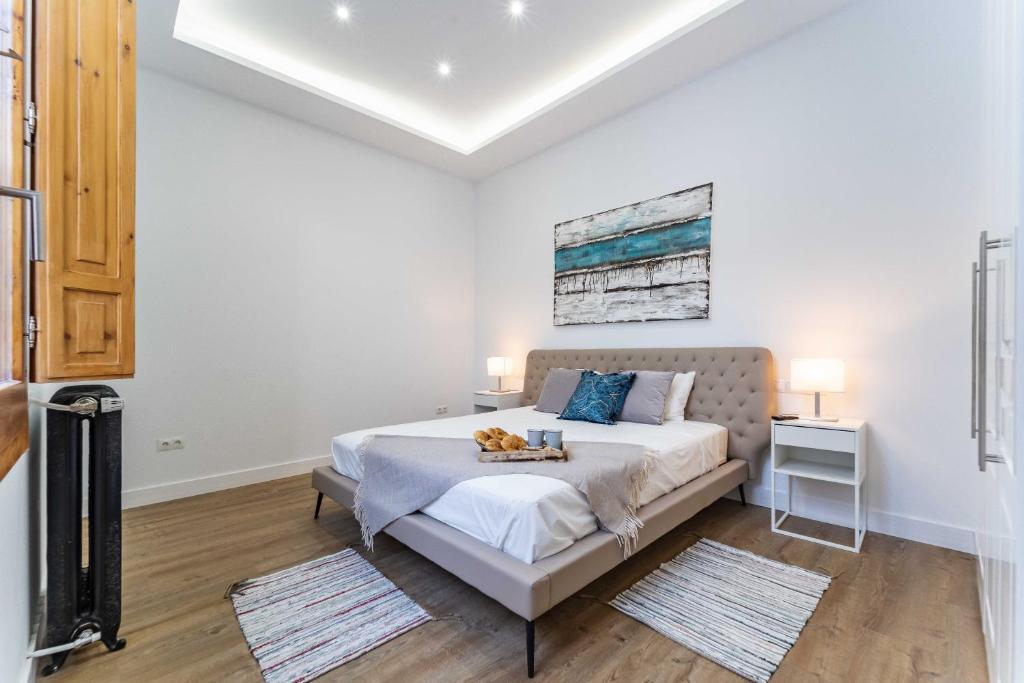 Postel nebo postele na pokoji v ubytování Exclusive Luxury Apartment in Central Madrid