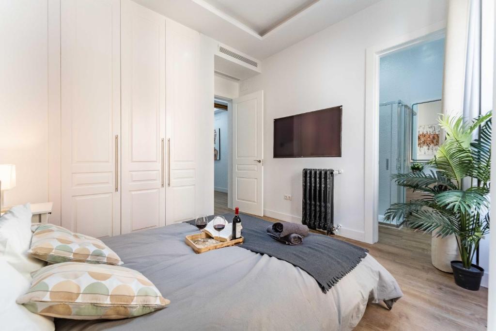 Postel nebo postele na pokoji v ubytování Exclusive Luxury Apartment in Central Madrid