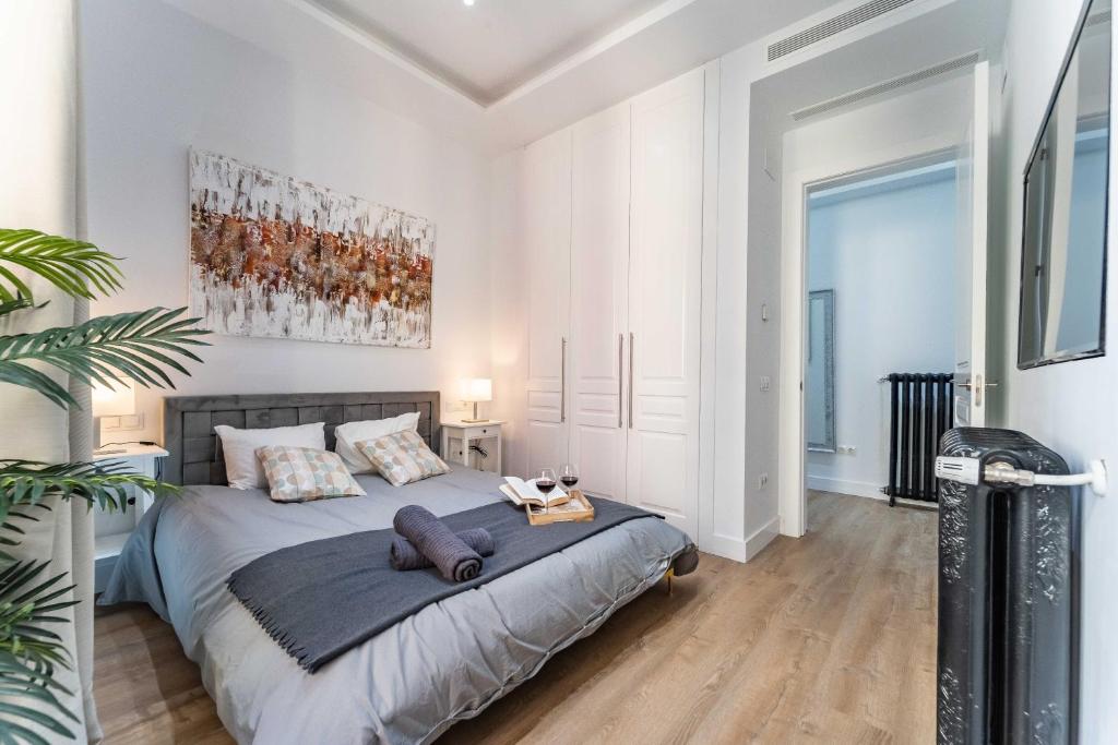 Postel nebo postele na pokoji v ubytování Exclusive Luxury Apartment in Central Madrid