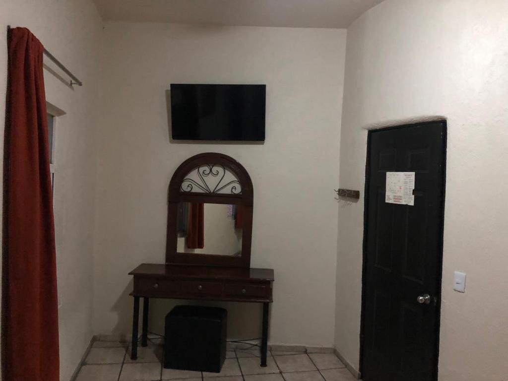 TV a/nebo společenská místnost v ubytování Hotel Vigo