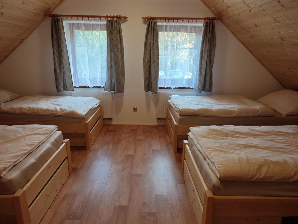 Postel nebo postele na pokoji v ubytování Ubytování Niki