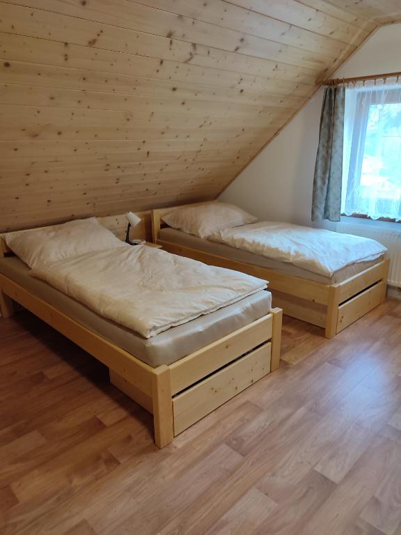 Postel nebo postele na pokoji v ubytování Ubytování Niki