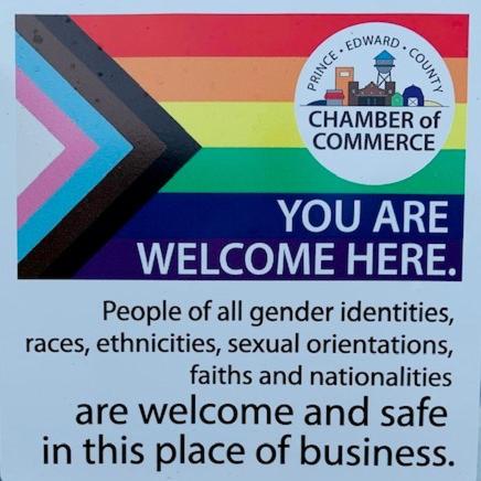 a sign that says you are welcome in this place of business at The 1885 Suites in Picton