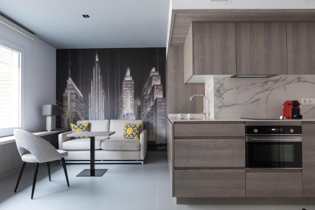 A kitchen or kitchenette at Apartamentos Las Torres