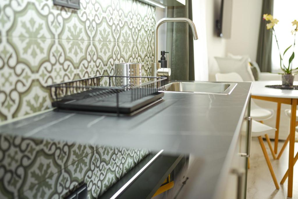 Kuchyň nebo kuchyňský kout v ubytování Raba92 Apartman House