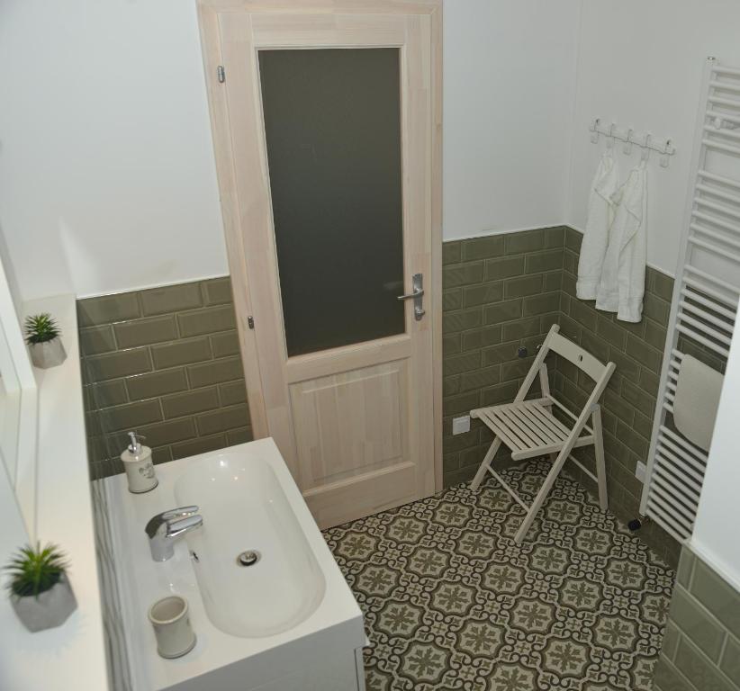 Koupelna v ubytování Raba92 Apartman House