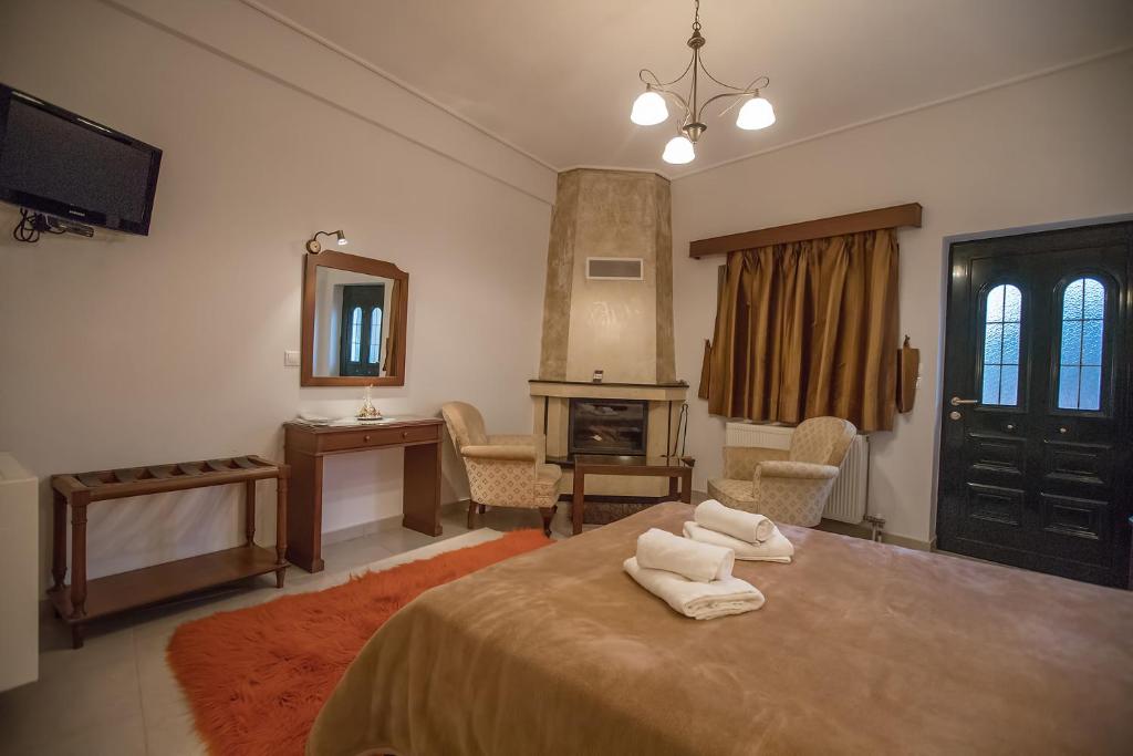 Postel nebo postele na pokoji v ubytování Nefeles