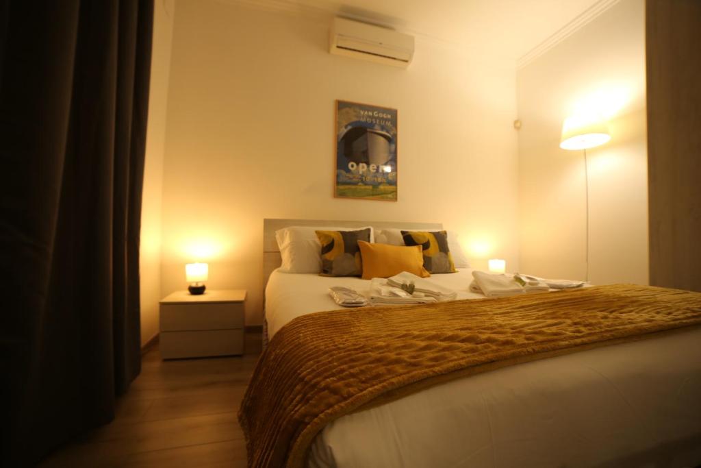 A bed or beds in a room at Appia Antica Guest House