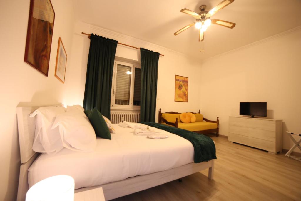 A bed or beds in a room at Appia Antica Guest House
