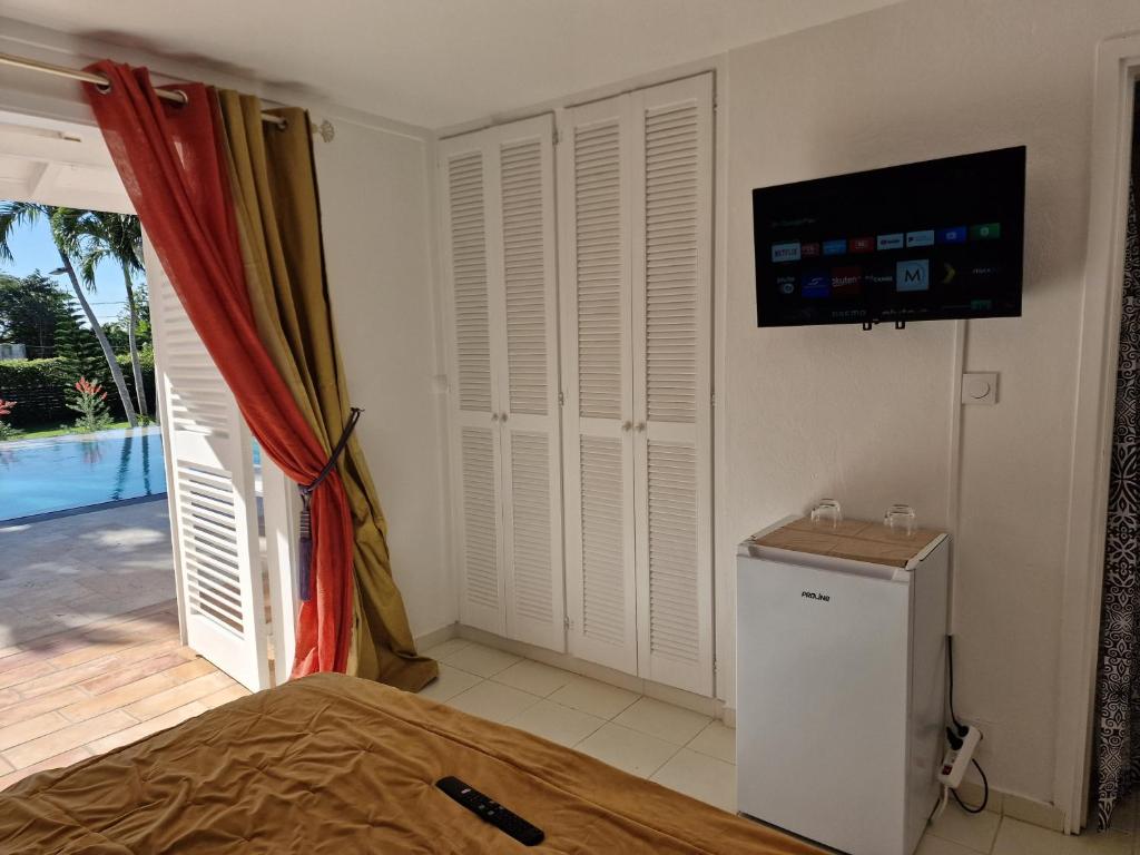 TV a/nebo společenská místnost v ubytování Appartements de Luxe . Propriété de Luxe