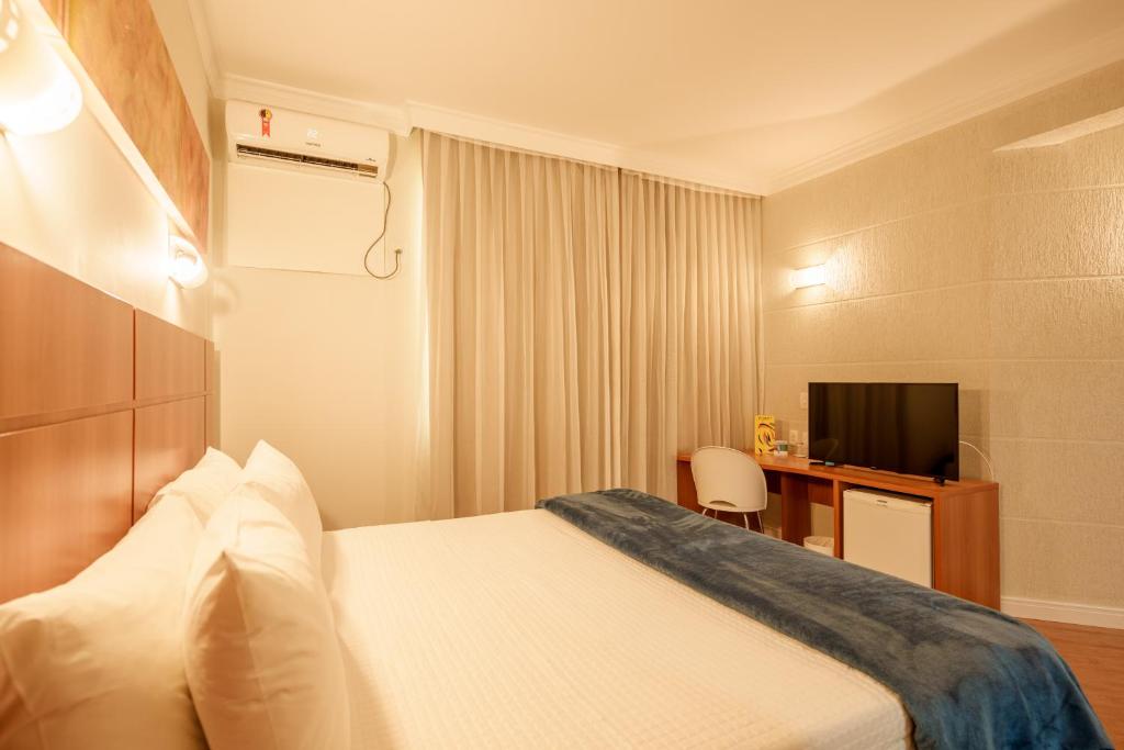 TV a/nebo společenská místnost v ubytování Central Park Hotel by Bourbon