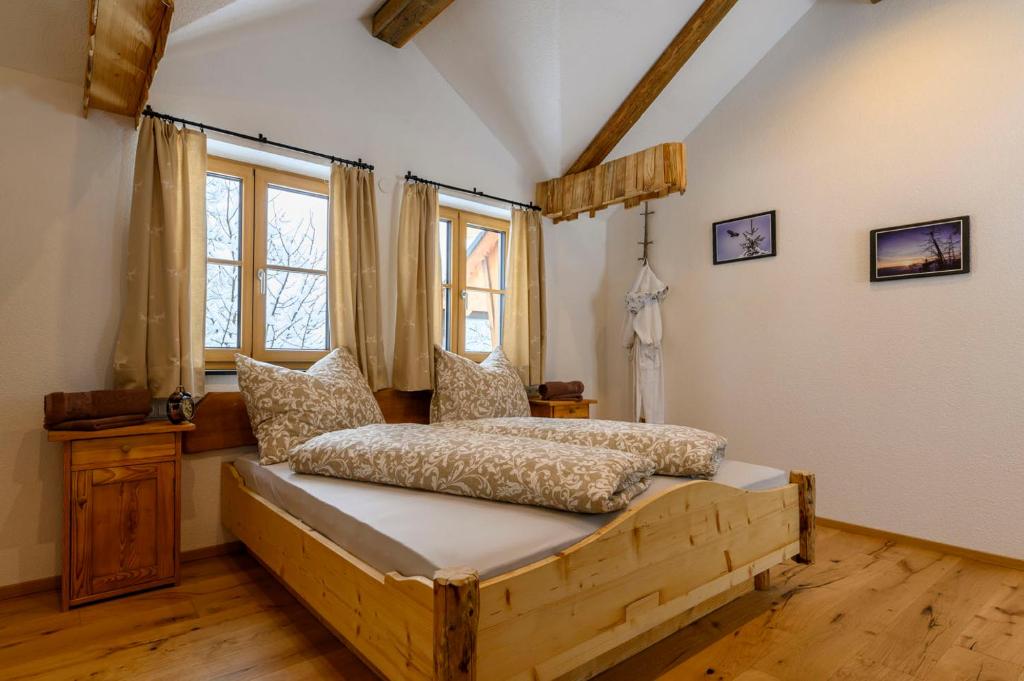 Postel nebo postele na pokoji v ubytování Goiserer Chalet