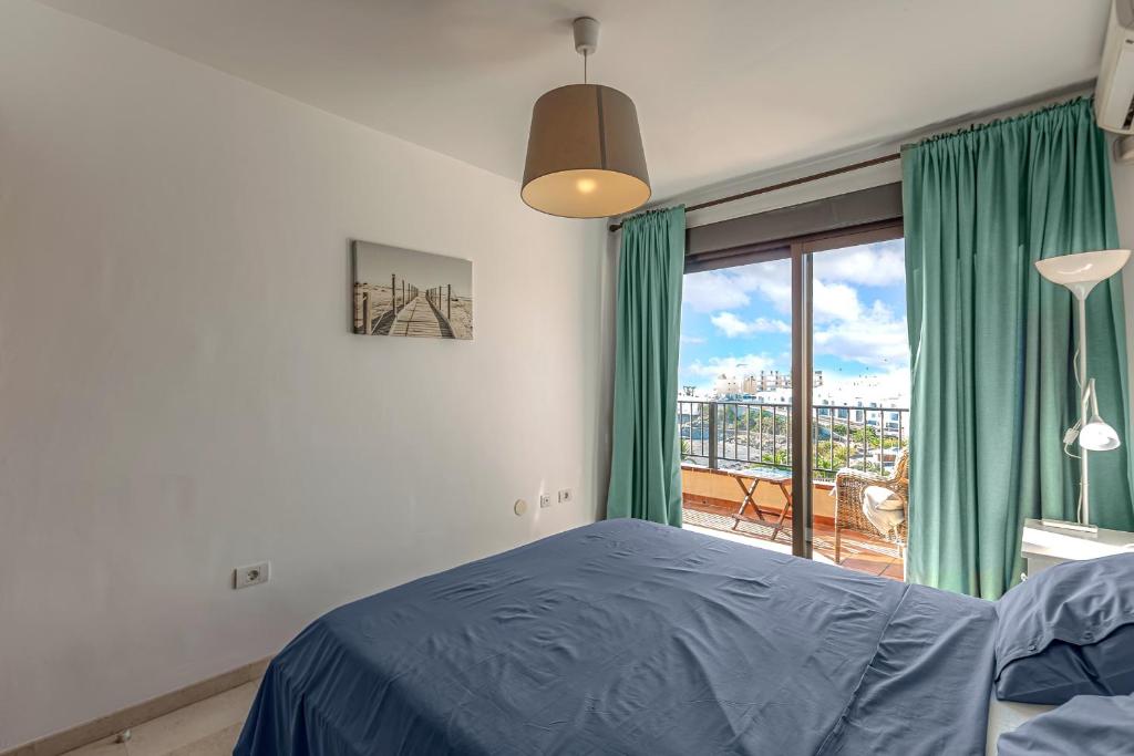 Postel nebo postele na pokoji v ubytování Casa del Mar