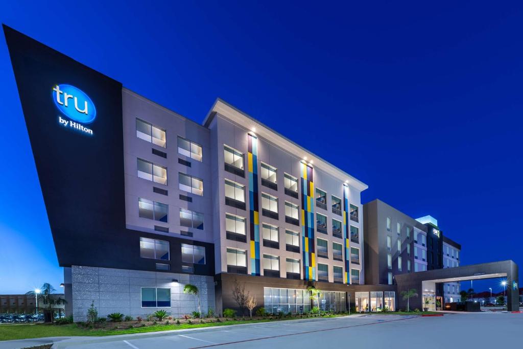 a rendering of a hotel with a lit up building at Tru By Hilton Laredo Airport Area, Tx in Laredo