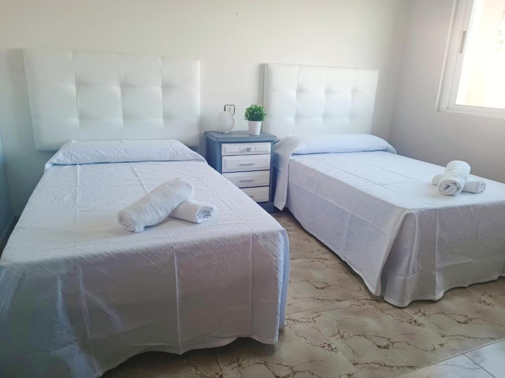 Postel nebo postele na pokoji v ubytování Casa El Rincón de Alberto con Piscina CLIMATIZADA y Calefacción