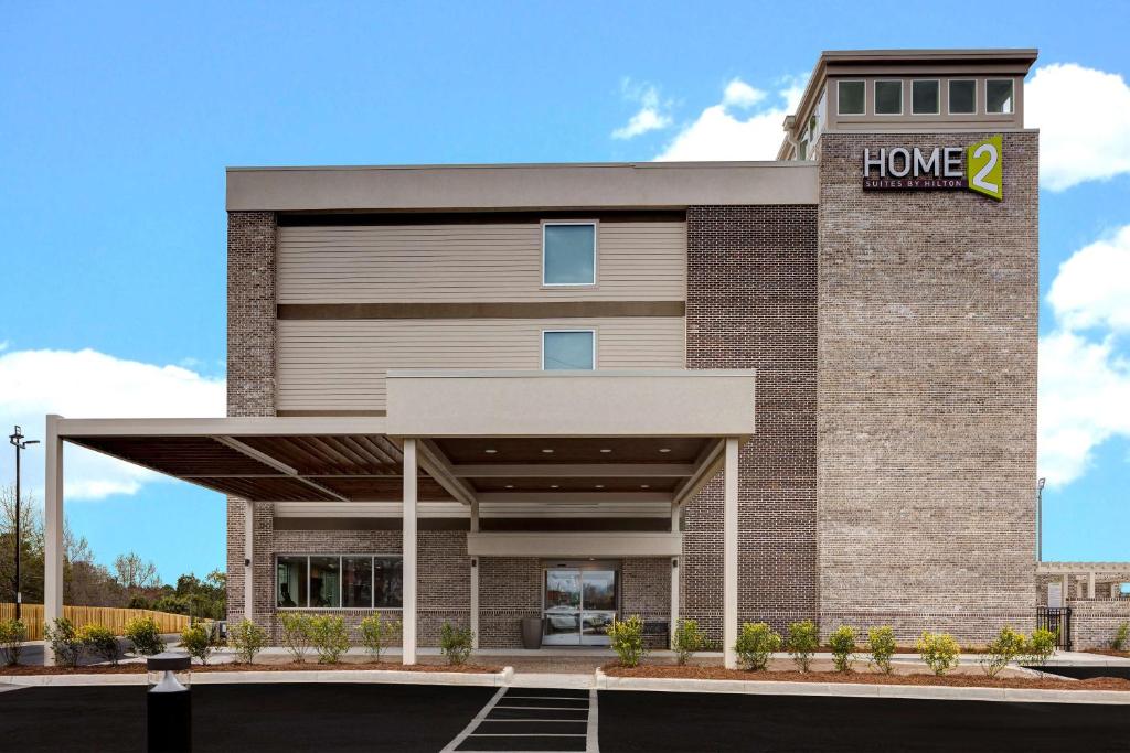 a home office building with a sign on it at Home2 Suites By Hilton Blythewood, Sc in Blythewood